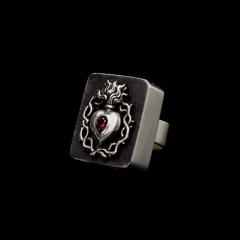 Sacred Heart Ring with a red garnet